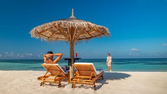 Batch Ozen Life Maadhoo Lifestyle Couple Lounging On Beach 3 (exp 01.2029)