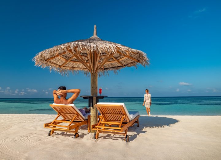 Batch Ozen Life Maadhoo Lifestyle Couple Lounging On Beach 3 (exp 01.2029)
