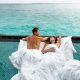 Sheraton Maldives Full Moon Resort & Spa Couple In Overwater Villa