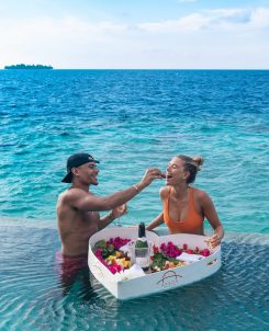 Couple With Floating Breakfast