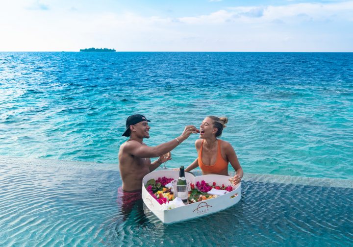 Couple With Floating Breakfast
