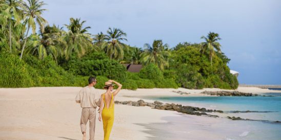 The Westin Maldives Miriandhoo Resort Couple Beach Walk