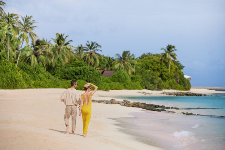 The Westin Maldives Miriandhoo Resort Couple Beach Walk