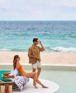 The Westin Maldives Miriandhoo Resort Couple At The Poolside