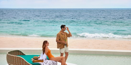 The Westin Maldives Miriandhoo Resort Couple At The Poolside