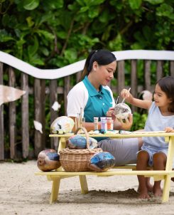 The Westin Maldives Miriandhoo Resort Coconut Painting at Westin Family Kids Club