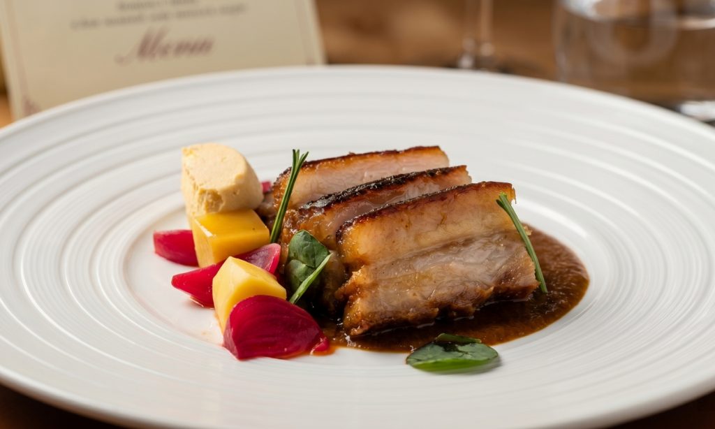 Batch 674569 Benguela Shores at Dusk 12 hour sous vide pork belly glazed with smoky chilli and Spanish chorizo jus Caravela at NH Collection Maldives Reethi Resort 88098e original