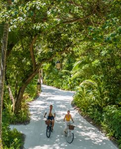 Batch Niyama Private Islands Maldives Couple on The Bike Greenery