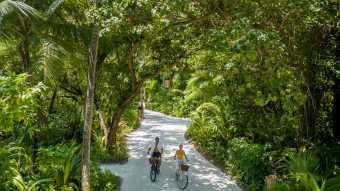 Batch Niyama Private Islands Maldives Couple on The Bike Greenery