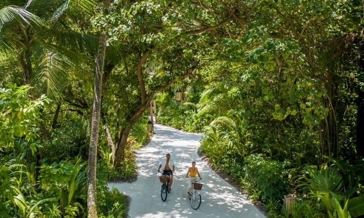 Batch Niyama Private Islands Maldives Couple on The Bike Greenery