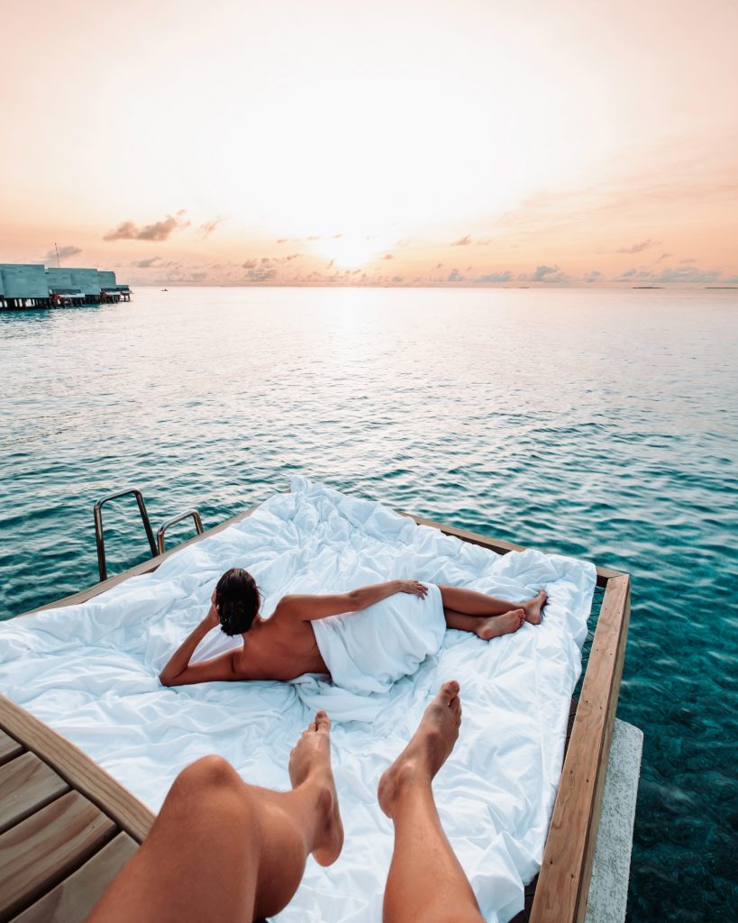 Batch Alila Kothaifaru Maldives Overwater Villa Lifestyle Couple in a Hammock