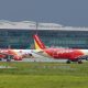 Vietjet aircraft prepare to take off at Tan Son Nhat airport in Ho Chi Minh